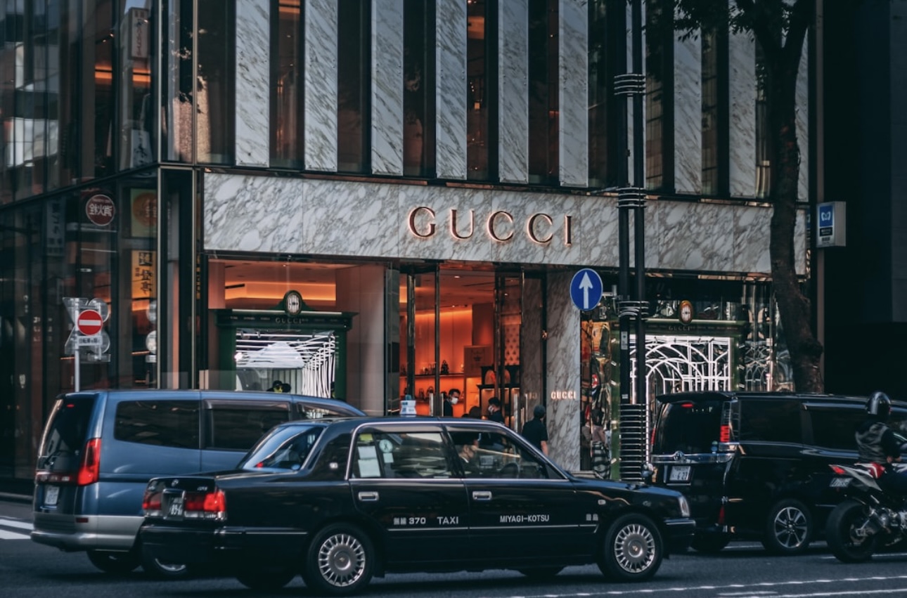 A stunning view of a Gucci store, embodying heritage, elegance, and modern luxury. Discover the legacy of Guccio Gucci and the brand's journey to global fame.